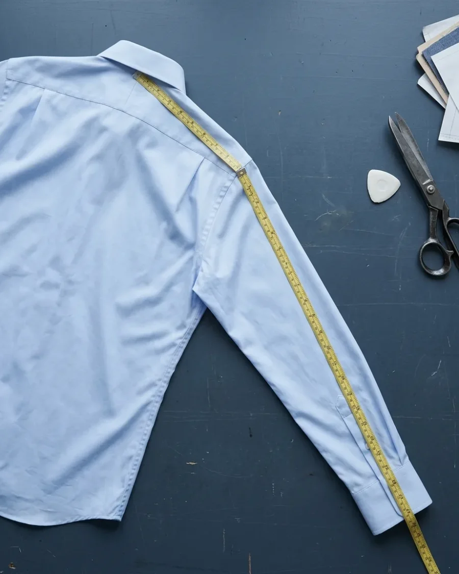 Measuring a shirt sleeve from the centre back of the collar to the cuff
